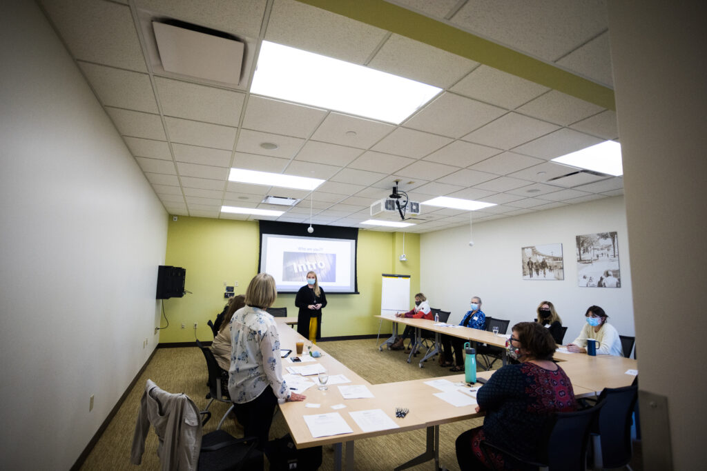 Photo of a presentation in a conference room