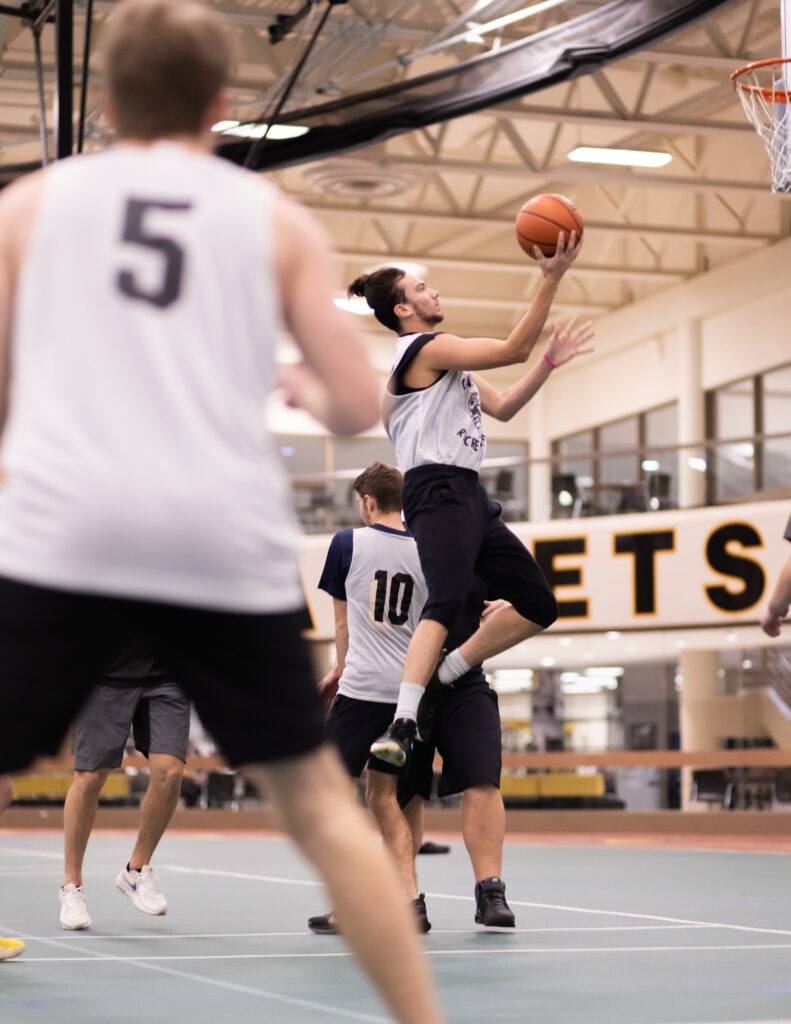 Students playing basketball