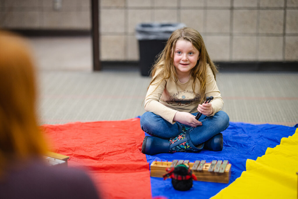 Girl in music lesson