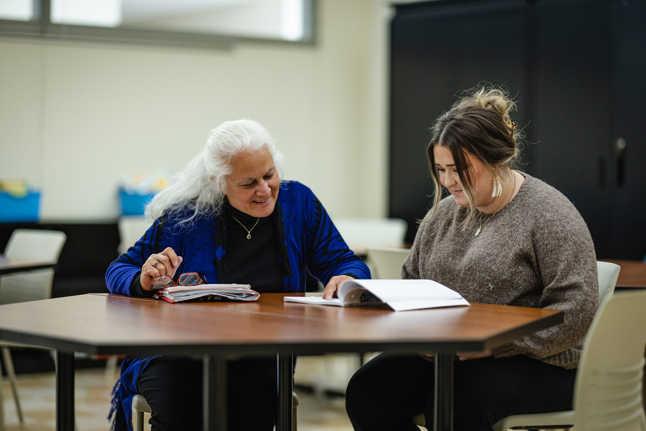 Jane Howard working with a Counseling Student