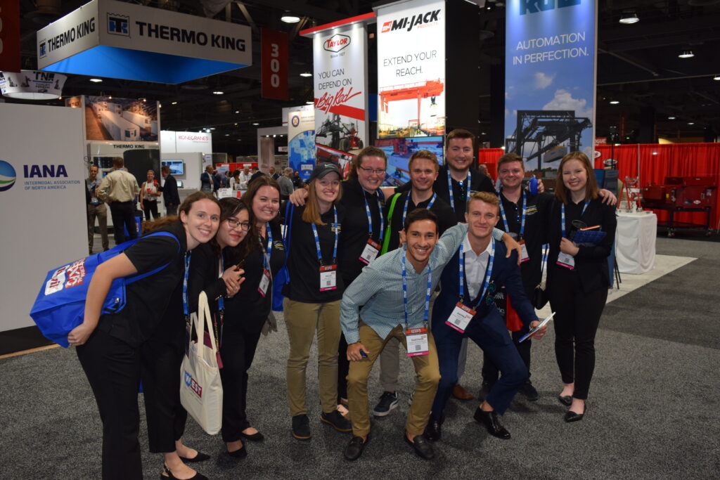 Students wearing lanyards at conference