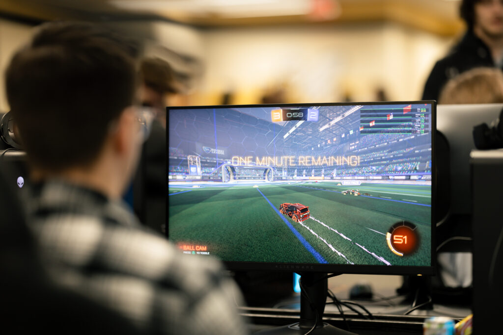 Student playing rocket league in the UW-Superior esports computer lab.