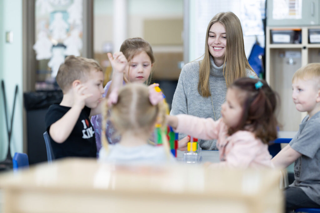 Student teaching many young children