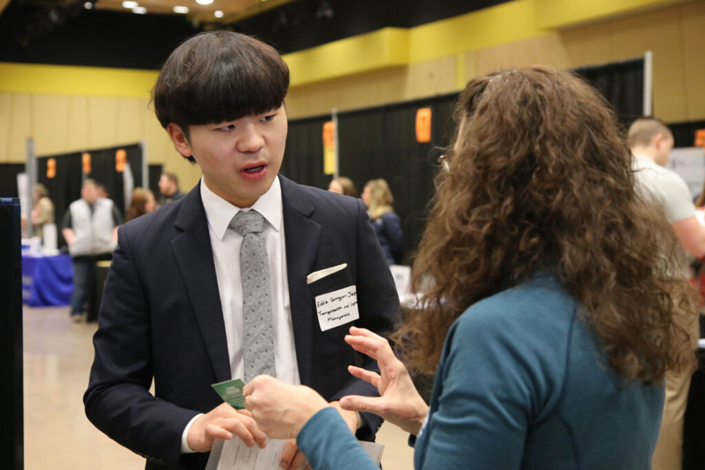 Student talking with representative at Career Fair