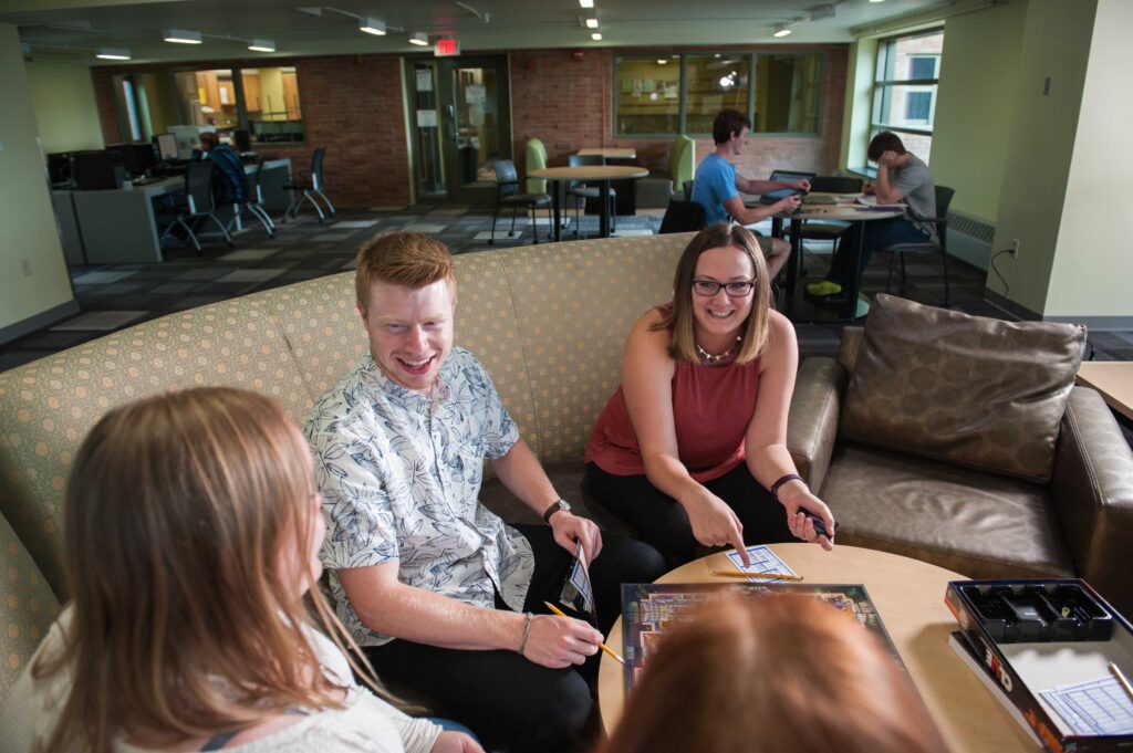 Students hanging out in Ross-Hawkes Link