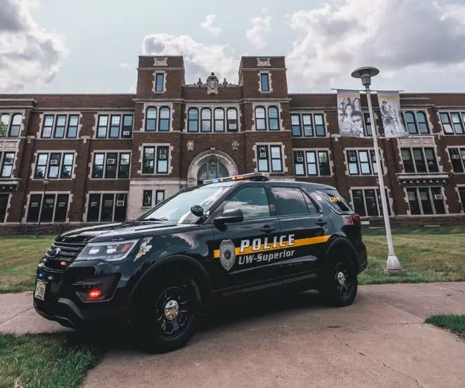 UW-Superior police car in front of Old Main