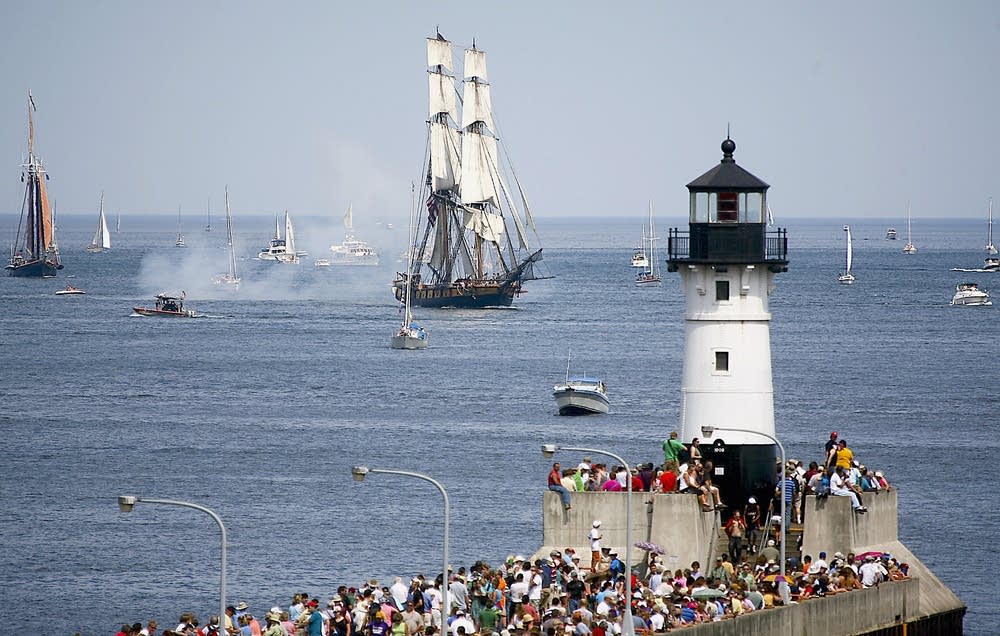 People at the lighthouse watching ships