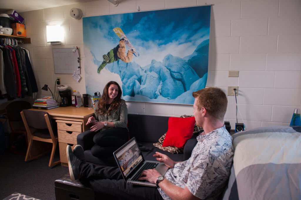 Students hanging out in dorm room