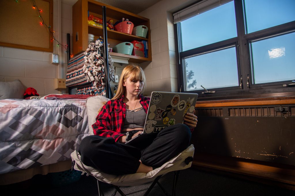 Student in their dorm room