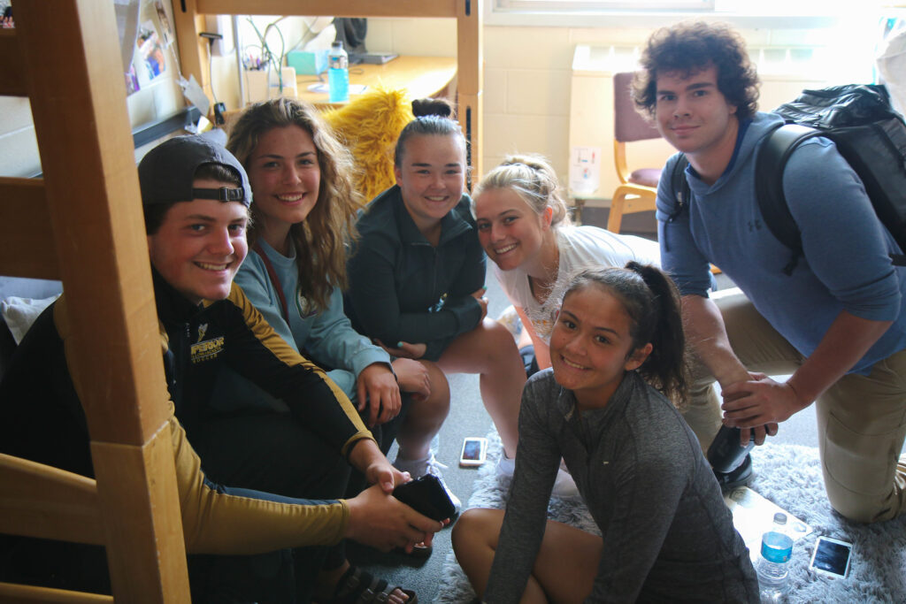 Group photo in dorm room