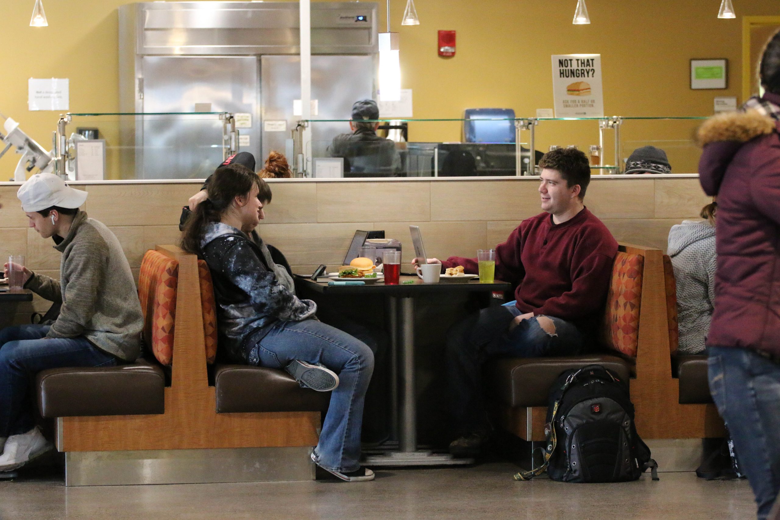 Students eating together in cafeteria