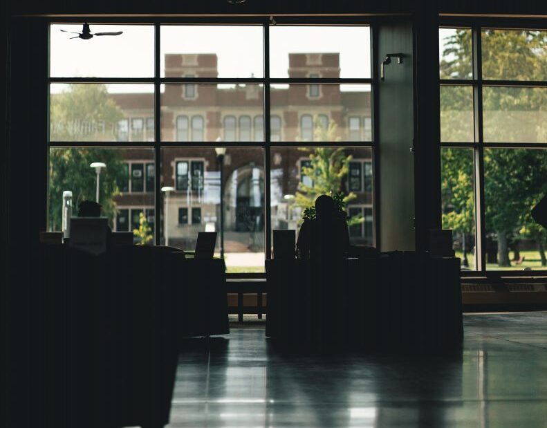 Old Main showing through the Swenson windows