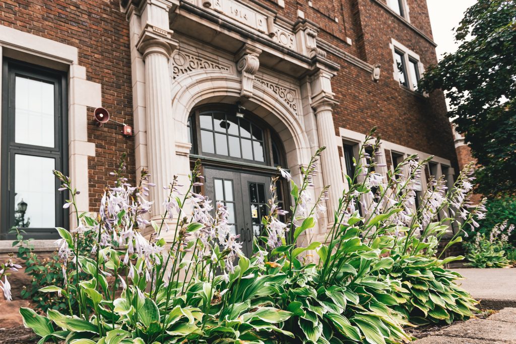 Flowers in front of campus building