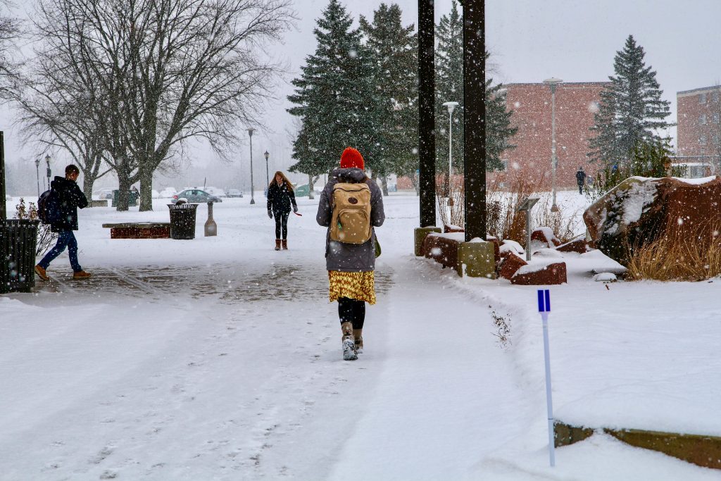 Students walking through the snow