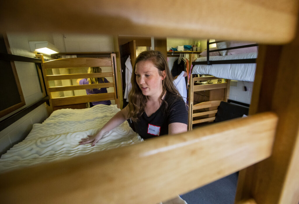 Move-in staff helping student